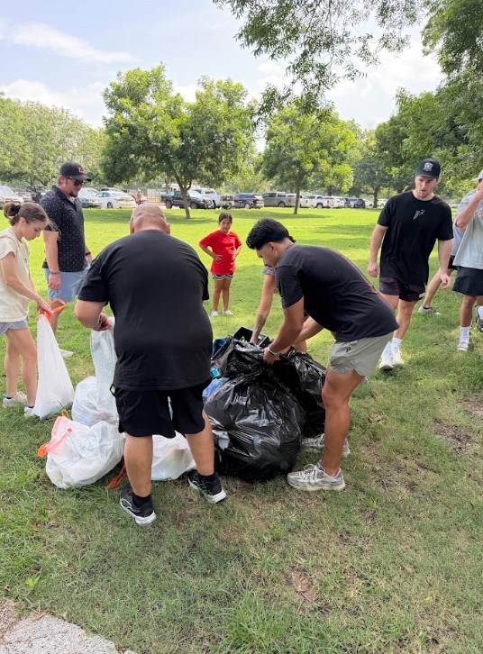 Transcending Personal Training group cleaning up the street