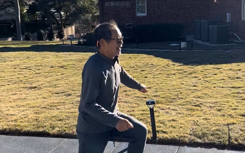 Senior fitness client doing a lunge outdoors with Transcending Personal Training in Austin TX